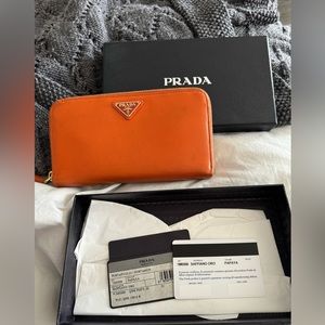 Vintage PRADA Saffiano 1M0506 Women's Leather Long Wallet [bi-fold] in papaya